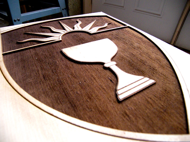 Solid maple laser engraved crest 6