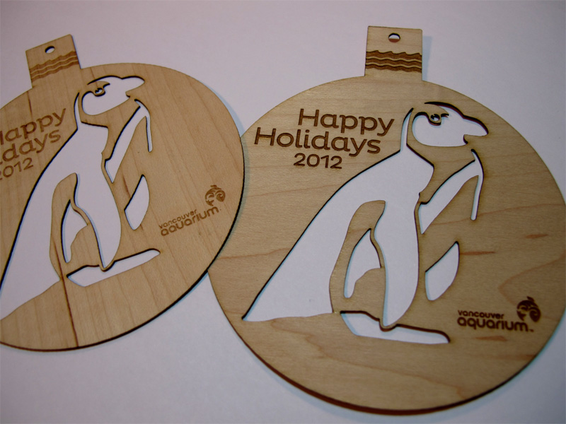 Custom laser cut wood Christmas tree ornaments (detail)