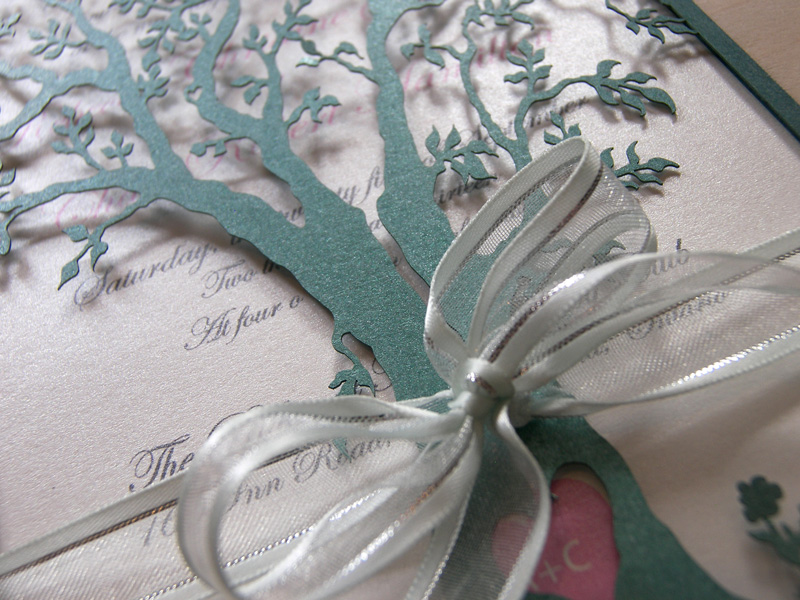 Love Tree laser cut wedding invitation detail in brown and green