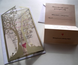 Ornate love tree laser cut wedding invitation and reply card with both sides closed and reply card open