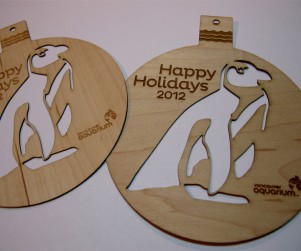 Detail of Custom laser cut wood Christmas tree ornaments for the Vancouver Aquarium