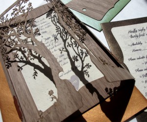 Detail of 'Love Tree' laser cut Walnut Wood wedding invitations