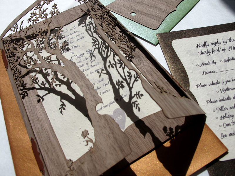 Detail of 'Love Tree' laser cut Walnut Wood wedding invitations