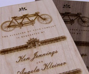 Maple and Walnut laser cut and engraved wedding invitations close up