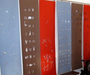 Laser cut merino wool felt window coverings for kids rooms, 6 wall hangings side by side mounted on sliding tracks