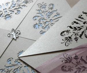 French flair laser cut wedding invitations close detail shot