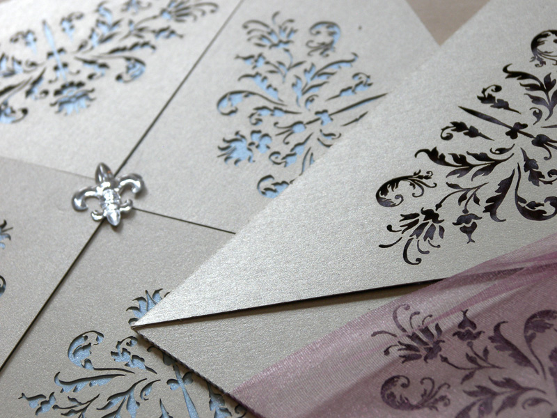 French flair laser cut wedding invitations close detail shot