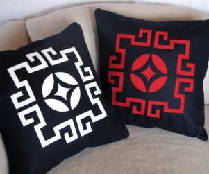 Laser cut throw pillows in white and red